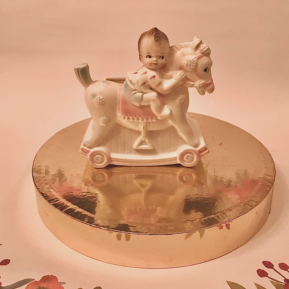 Vintage rocking horse baby planter